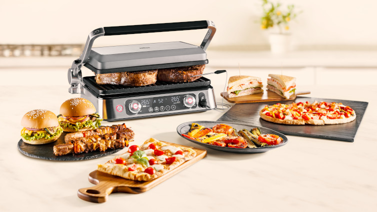 Braun Multigrill 9 Pro mit verschiedenen Gerichten.